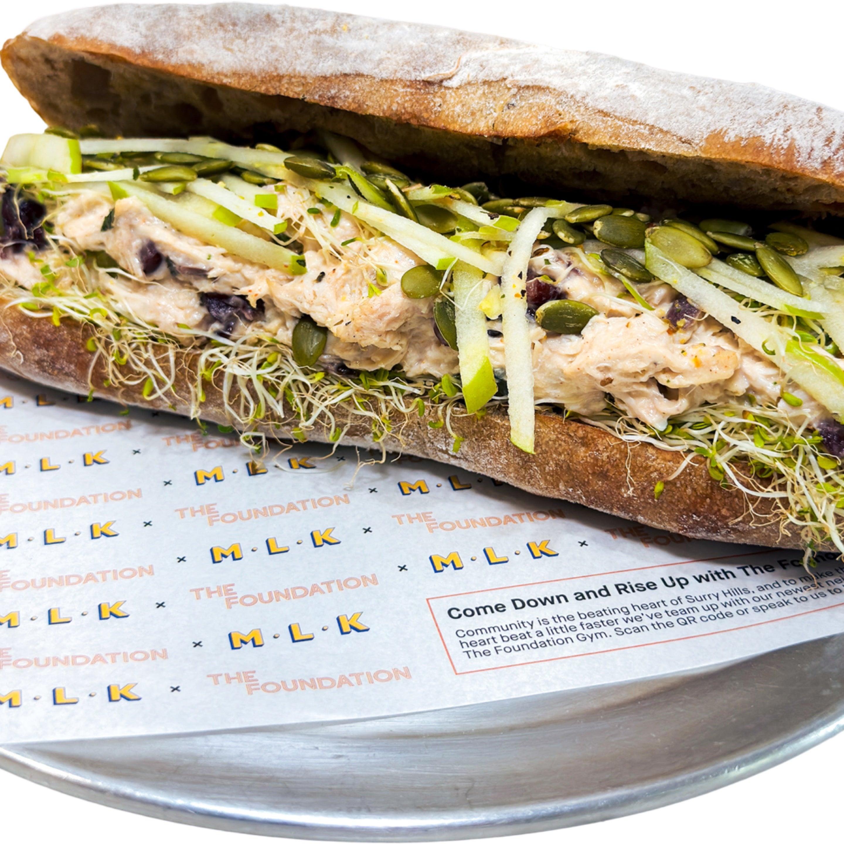 MLK Deli Side Chick sandwich with poached chicken, cranberries and apple
